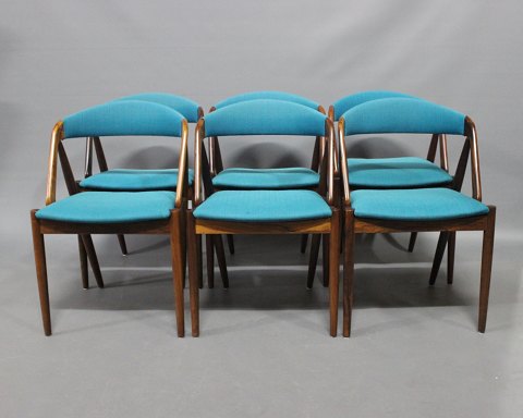 A set of six dining room chairs, model 31,  by Kai Kristiansen and Schou 
Andersen.
5000m2 showroom.