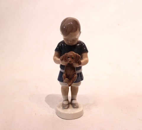 Porcelain figurine, boy with dog, no. 1747, by Bing and Grøndahl.
5000m2 showroom.