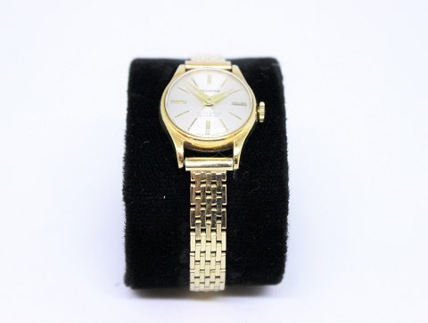 Candino wrist watch, case of 18 ct. gold and chain with 7 rows of 14 ct. gold.
5000m2 showroom.
