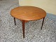 Round dining table in teak  with from the 1960s.
5000m2 showroom.
