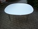 Piet Hein table in white laminate with steel edge 145 * 145 for 8 persons 5000 
m2 showroom
