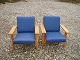 A couple of lounge chairs designed by Hans Wegner GE model 290 with blue wool 
fabric made &#8203;&#8203;from getams furniture factory in good condition 5000 
Showroom