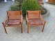 2 hvilestole tegnet af Arne Norell i brunt kernelæder med patina model safari i 
fin stand 5000 m2 udstilling 

