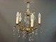 Old crystal chandelier from the around the year 1940  in brass.  
5000m2 showroom.