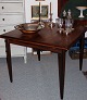 Spisebord kvadratisk i palisander m. 2 tillægsplader , hollandsk udtræk dansk 
design fra 1960érne . Mål 95 cm *  2*38 cm * H 75 cm 
5000 m2 udstilling