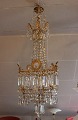 Crystal chandelier from France and the year 1880. The chandelier  is in gilded 
bronze and has been restored.¨
5000m2 showroom.