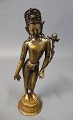Indian figure in patinated gilded metal, signed AS4R330.
5000m2 showroom.