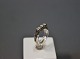 14 ct. gold ring with 3 stones, stamped EGM.
5000m2 showroom.