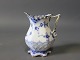 Royal Copenhagen blue fluted lace cream jug with gilded edge, no.: 1/1032.
5000m2 showroom.