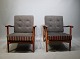 A pair of easy chairs in teak and dark grey wool upholstery, of danish design 
from the 1960s.
5000m2 showroom.