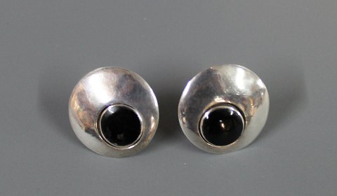Silver earrings  stamped 925 H.S. with black onyx. 5000 m2 showroom.