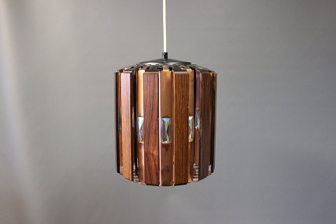 Ceiling lamp in rosewood designed by Werner Schou, Danish design from the 1960s.
5000m2 showroom.