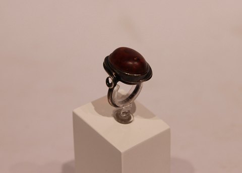 Silver ring with large piece of amber.
5000m2 showroom.