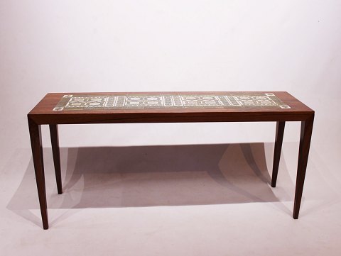 Side table in rosewood with tiles by Royal Copenhagen, by Severin Hansen and 
Haslev Furniture Factory from the 1960s.
5000m2 showroom.