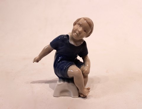 Porcelain figurine, sitting girl, no.: 2258 by Bing and Grøndahl.
5000m2 showroom.