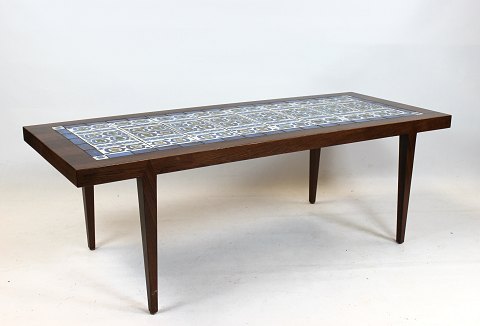 Coffee table of rosewood and dark blue tiles from Royal Copenhagen, by Severin 
Hansen for Haslev Furniture Factory from the 1960s.
5000m2 showroom.