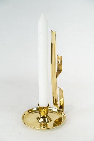 Candlestick of brass in Jugend style from the 1920s.
5000m2 showroom.