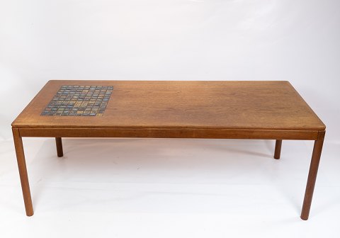 Coffee table in teak with brown ceramic tiles of danish design from the 1960s.
5000m2 showroom.