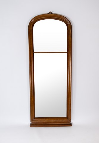 Tall mirror of mahogany from around the 1860s. 
5000m2 showroom.