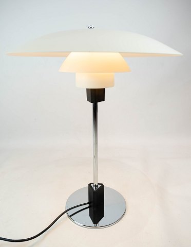 PH 4/3 table lamp designed by Poul Henningsen and manufactured by Louis Poulsen. 

5000m2 showroom.
