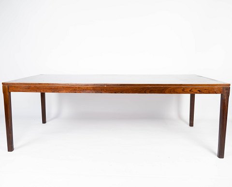 Coffee table in rosewood of danish design from the 1960s. 
5000m2 showroom.
