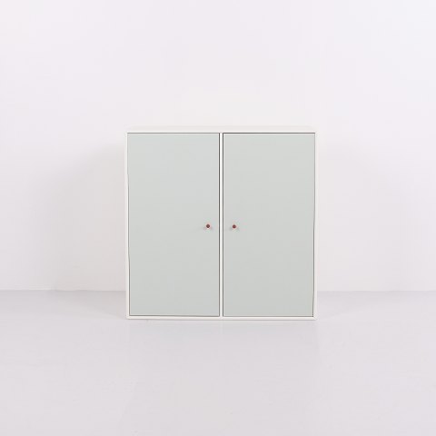 Montana Cabinet Module Model 1118 with Mint Green Doors and Brown Handles by Peter J. Lassen, 2 pieces in stock.