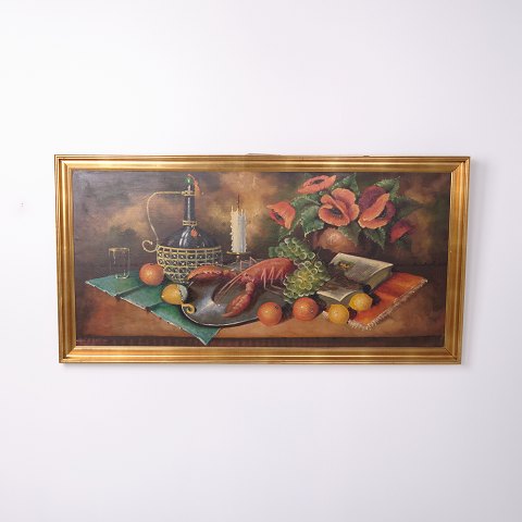 Large floral print in a gilt frame