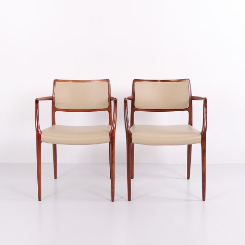 Pair of Model 65 Armchairs in Rosewood with Light Elegance Leather by N.O. Møller for J.L. Møllers Møbelfabrik