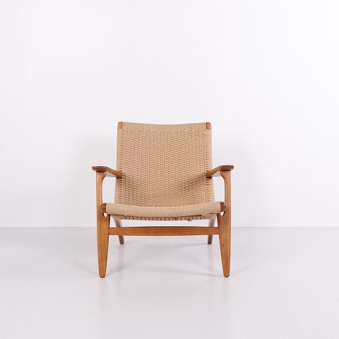 Hans J. Wegner CH25 Armchair in Patinated Solid Oak and Woven Cord