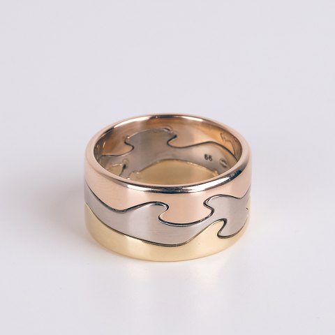 Georg Jensen Fusion Ring in 18-carat gold, featuring red gold, white gold, and rose gold.