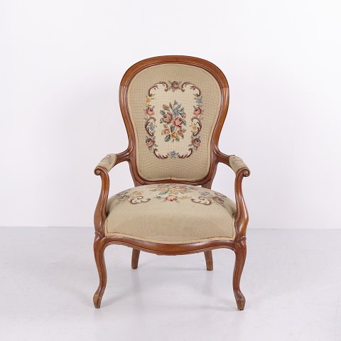 French Louis XV Style Armchair with Floral Upholstery circa 1890–1920