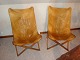 2 Hvilestole/folde
stole i cognac farvet brunt patineret læder tegnet af J Hardy 
5000 m2 udstilling
