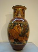 Floor Vase by Herman Kähler with fish motifs in beautiful brownish shades. 
Height 33 cm. 
5000m2 showroom.