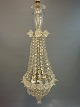 Antique crystal chandelier sack shaped from around 1920.  5000m2 showroom.