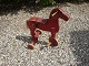 Three wheeled bike-horse in a reddish color and in good condition. 
5000 m2 showroom.