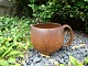 Jug in a brownish color, designed and signed by Arne Bang No. 406. Height 11 cm  
and in perfect condition. 
5000 m2 showroom.