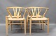 4 Hans Wegner chairs, the Y chair ch 24 model with hand woven seats in lacquered 
ash. 5000 m2 showroom