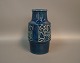 Ceramic vase with blue glaze and motif on the sides by Michael Andersen and son, 
no. 6134.
5000m2 showroom.