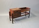 Small sideboard in rosewood with glass shelf by Arne Vodder. Danish Design from 
the 1960s.
5000m2 showroom.