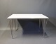 Rectangular dining table by Piet Hein, Arne Jacobsen, Bruno Mathsson and Fritz 
Hansen.
5000m2 showroom.
