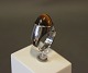 Ring in 925 sterling silver and brown stone stamped MPC by M.P.Christoffersen.
5000m2 showroom.