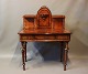 Ladies desk in handpolished walnut from the 1860s.
5000m2 showroom.