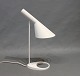 Arne Jacobsen, white tablelamp, designed in 1960 and manufactured by Louis 
Poulsen.
5000m2 showroom.