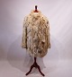 Light fur coat by an unknown brand, in great vintage condtion.
5000m2 showroom.