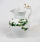 White porcelain chocolate jug decorated with gold and green colors.
5000m2 showroom.