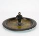 Round dish of bronze decorated with boy figure.
5000m2 showroom.