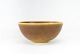 Ceramic bowl in dark yellow color by Palshus from 1968.
5000m2 showroom.