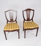 A set of dining room chairs of mahogany and upholstered with striped fabric from 
the 1920s. 
5000m2 showroom.