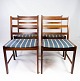 A set of four dining chairs in rosewood and seats upholstered with blue striped 
fabric, of danish design from the 1960s.
5000m2 showroom.
