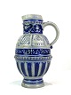 Ceramic jug in grey and blue colours, numbered 58, from around the 1940s. 
5000m2 showroom.
Great condition
